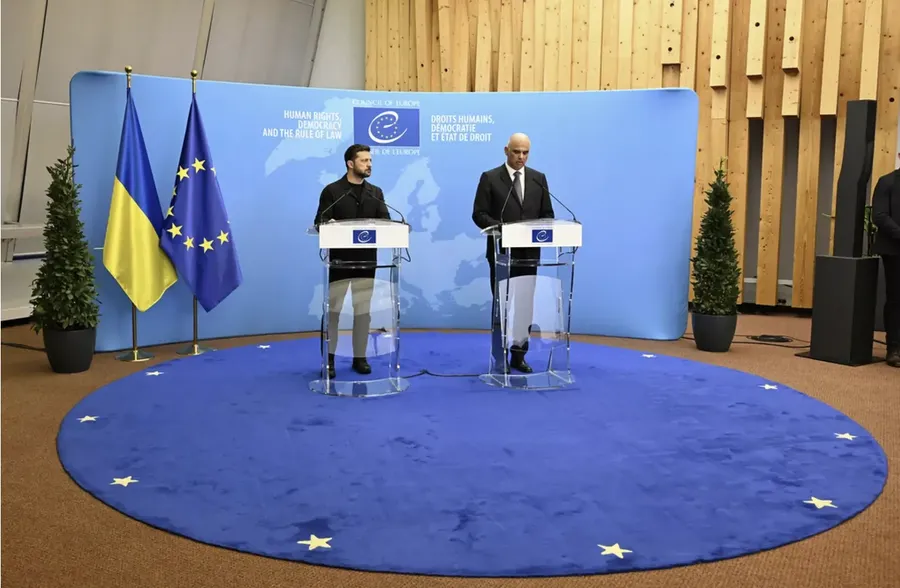 President Zelensky and CoE chief Berset standing behind podiums at a press conference